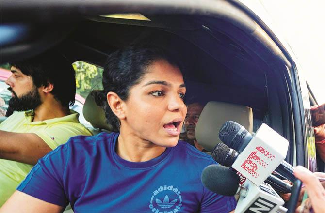 Wrestler Sakshi Malik talking to the media after a meeting with Sports Minister