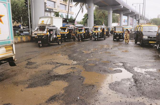 Potholes on the road are causing severe problems for motorists and passengers. (File Photo)