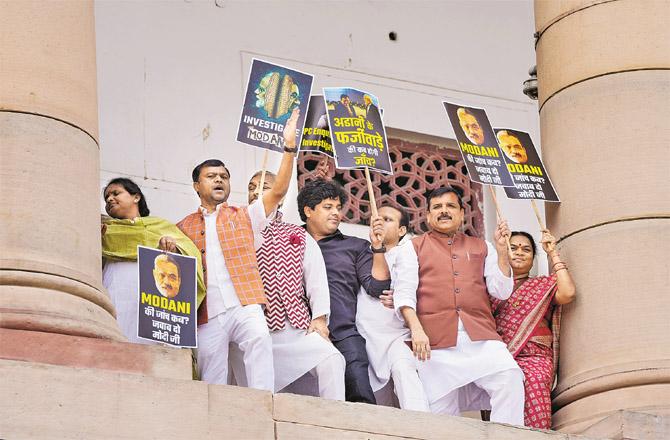 Opposition members protested on the first floor of the Parliament building. (PTI)