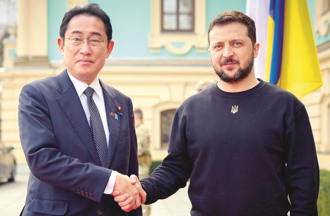 Fumiokshida and Vladimir Zelensky. (AP/PTI)