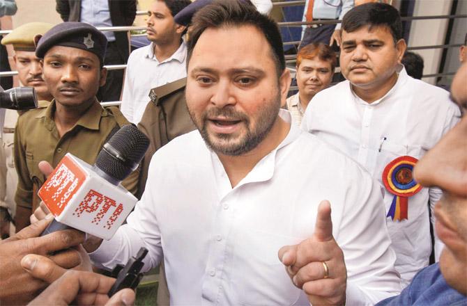 Tejashwi Yadav talking to the media. He did not attend the CBI office on Saturday.