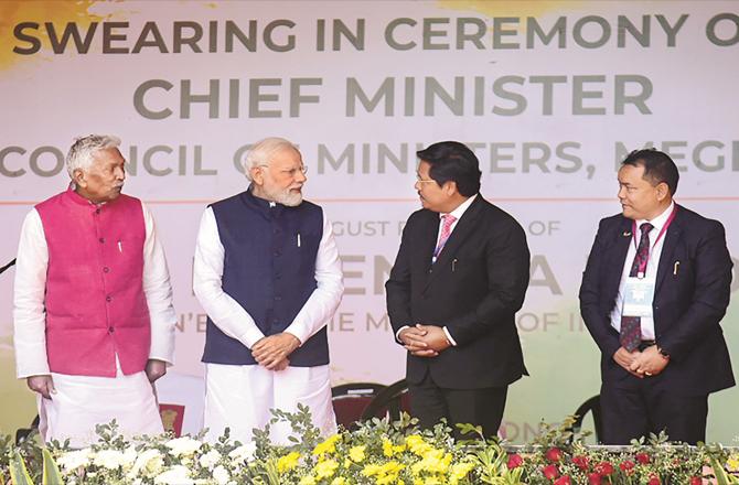 Prime Minister Narendra Modi with newly elected Meghalaya Chief Minister Conrad Sangma and Governor Phagu Chauhan