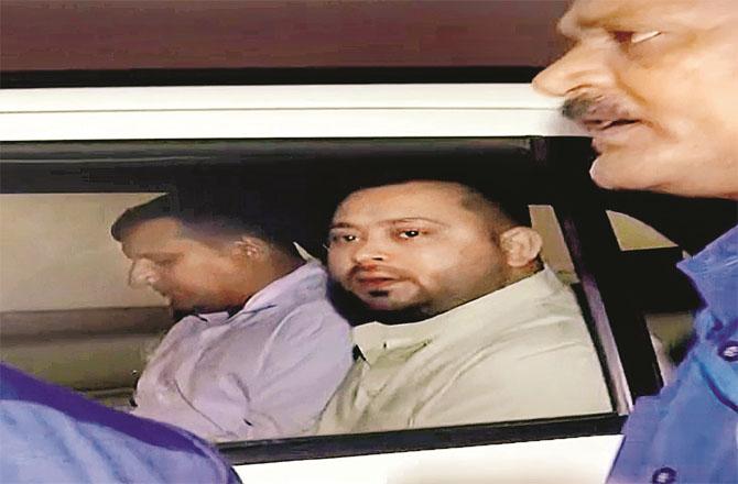 RJD chief Lalu Prasad Yadav`s son and Bihar Deputy Chief Minister Tejashwi Yadav on his way to CBI office for attendance.