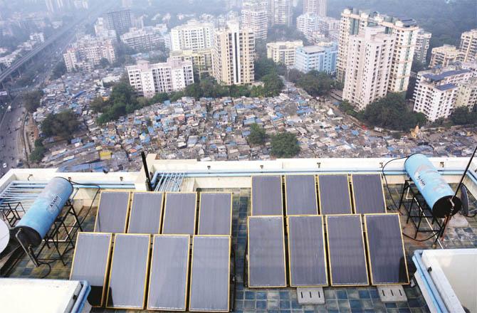 A solar panel or rain harvesting system is seen on a building. (file photo)