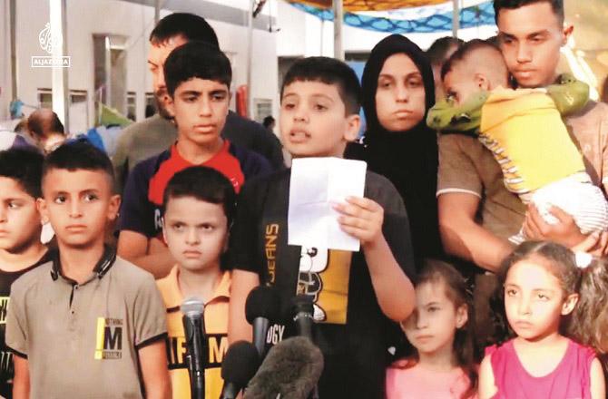 In the past few days, the children of Gaza tried to honor the dead rulers of the world by holding a press conference. Photo: INN