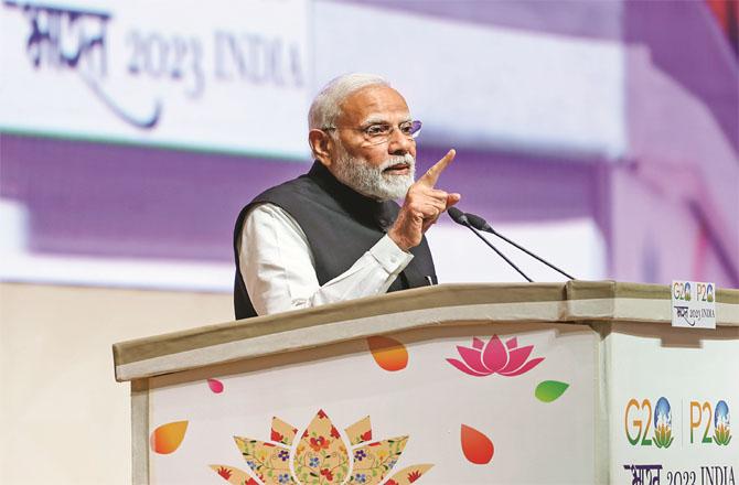 Prime Minister Modi can be seen speaking at the Parliamentary Speakers Session. Photo: PTI