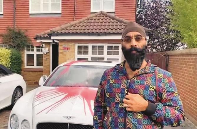 Harman Singh Kapoor had paint thrown on his car outside his house. Photo: INN