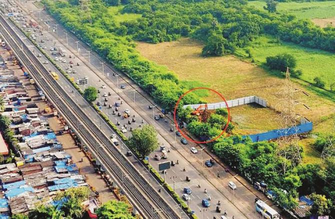 Construction of CNG station at Aarey Colony site adjacent to Western Express High is in progress. (in circle). Photo: INN