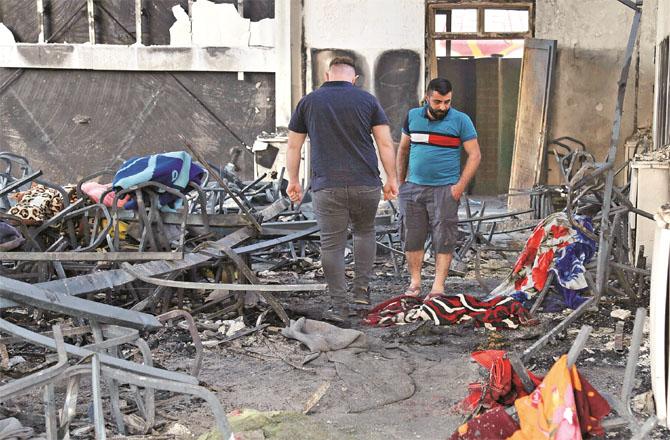 The severity of the fire in the wedding hall in Nineveh can be estimated from the picture in which everything looks gray.Photo. INN