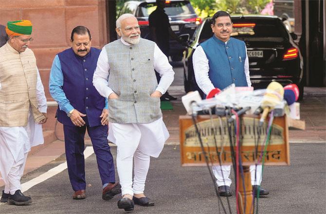 Prime Minister Modi on his way to address the media outside Parliament. (PTI)