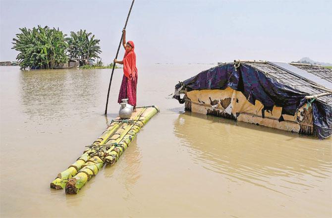 In a village of Morigaon district, a woman surrounded by floods has made such an arrangement. (PTI)