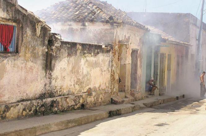 Fogging is seen in a street in Cuba. Photo: INN