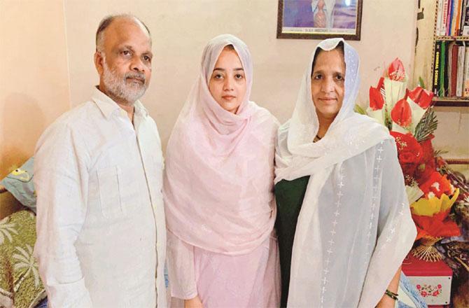 Fauzia Jahan, who passed the judge`s exam, with her parents