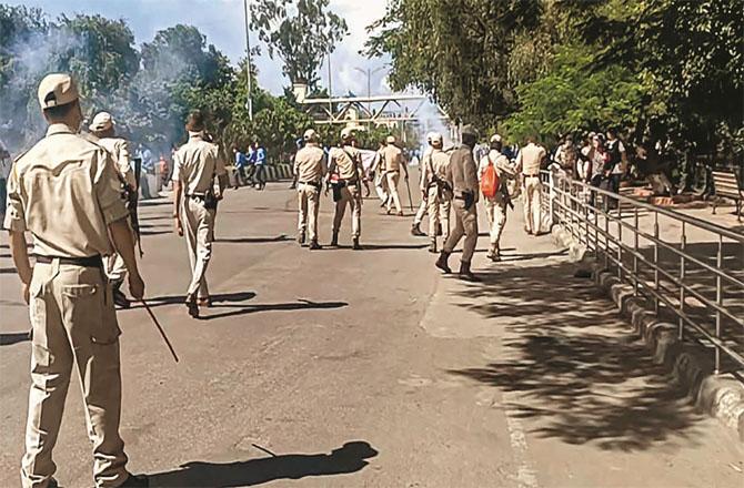 Police used lathi charge to disperse protesting students in Imphal. Photo.PTI