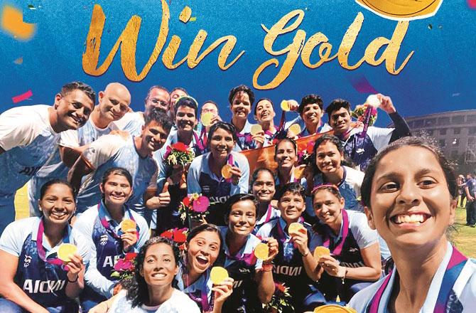 The gold medal winning women`s cricket team can be seen taking a selfie. Photo: INN