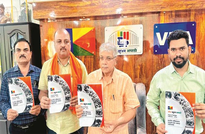 Prakash Ambedkar unveiling a copy of the manifesto with other leaders of Vinchat. Photo: Agency
