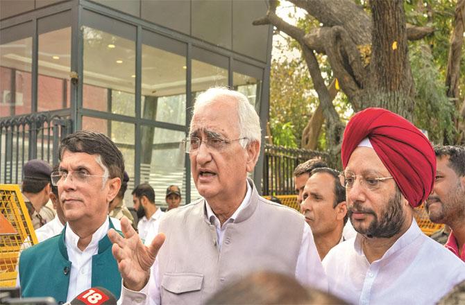 Salman Khurshid, Poon Kheda and Gurdeep Singh Supal during a conversation with the media. Photo: PTI