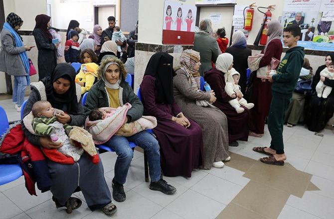 Mothers with their children in a hospital in Gaza. Image: X