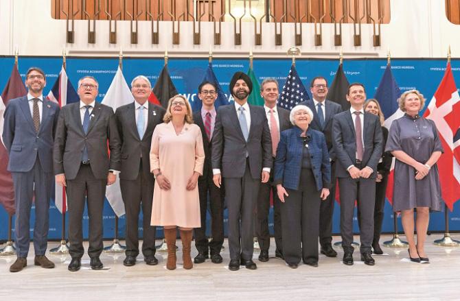 Officials from the IMF and other institutions at the World Bank headquarters. Photo: PTI
