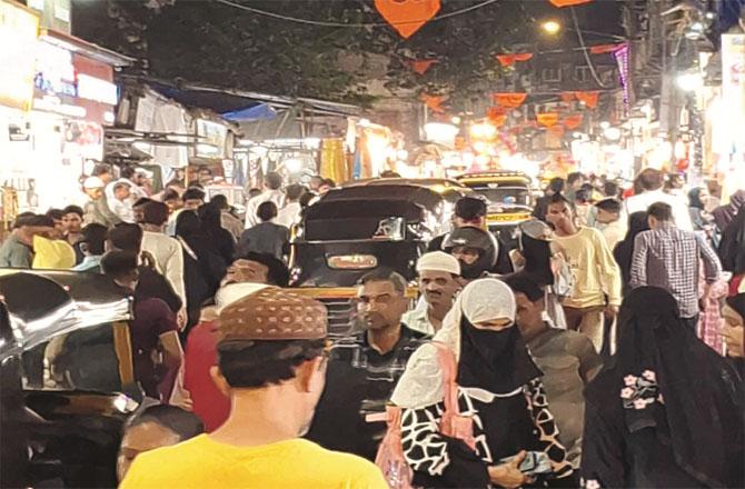Crowds of Eid shoppers can be seen in the market on Newmal Road. Photo: Inquilab