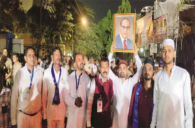 The participants of the rally in Maloni paying homage to Babasaheb Ambedkar. Photo: INN