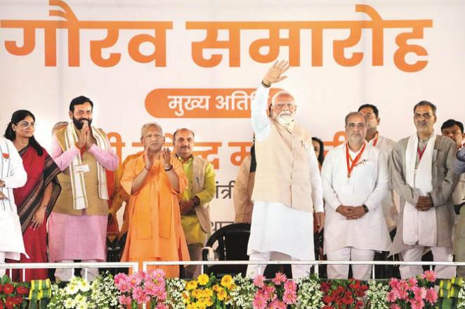 Prime Minister Modi can be seen attending a rally in Meerut, Chief Minister Yogi Adityanath can also be seen. Photo: PTI