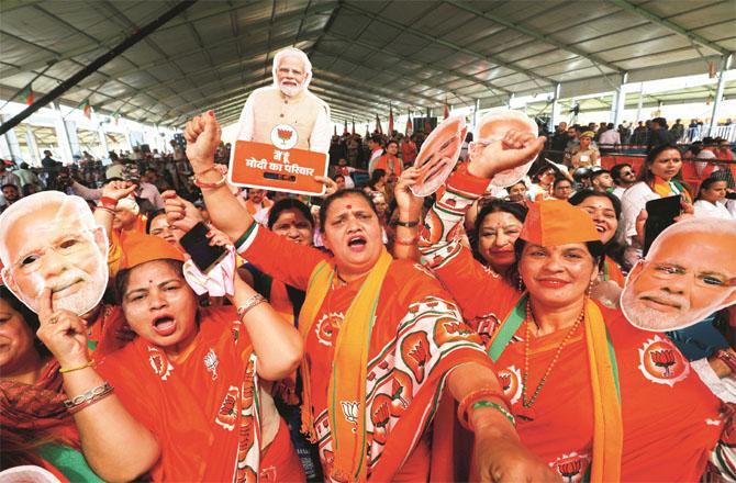 Women BJP workers present at Modi`s rally in Udhampur look excited. Photo: INN