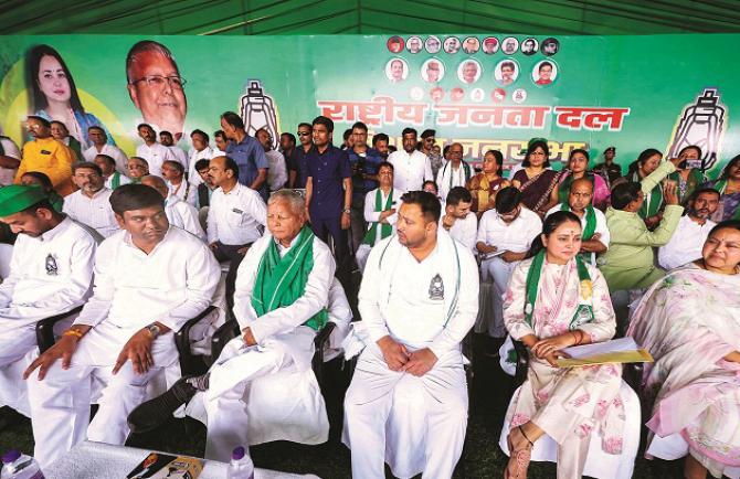 Lalu, Tejashwi and Rohini in a meeting after filing nomination papers. Photo: INN