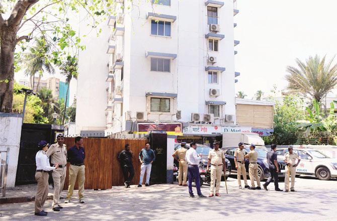 Officials of police and other security agencies outside Salman Khan`s residence. Photo: Shadab Khan