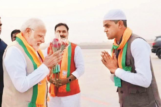 In a file photo, Usman Ghani welcoming the Prime Minister at the airport. Photo: INN