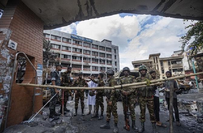 Scene of a police post burnt by violent protesters. Photo: INN