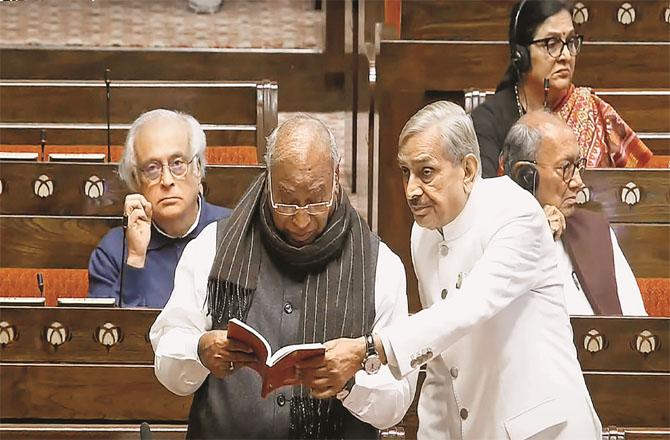 Digvijay Singh and Jairam Ramesh can be seen behind Pramod Tiwari and Mallikarjun Kharge in Rajya Sabha. Picture: INN