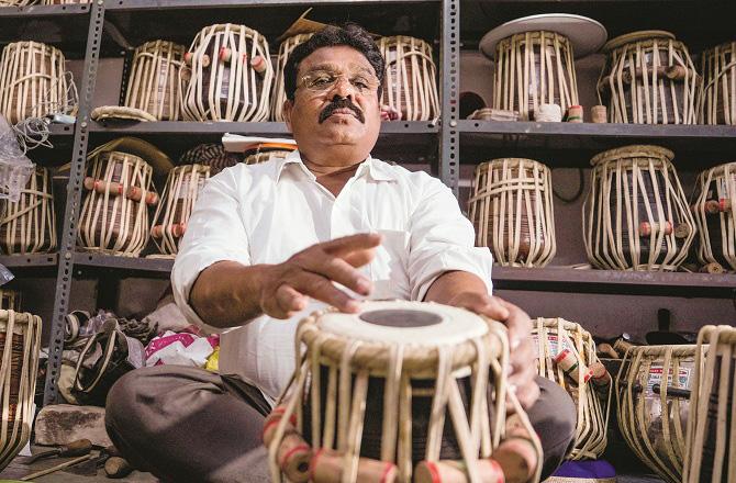 Tabla maker Haridas Watkar in his workshop. Photo: PTI