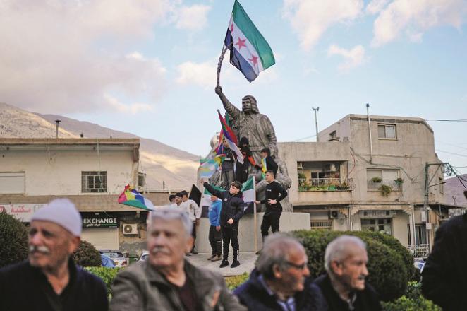 The end of the regime of Syrian President Bashar al-Assad is being celebrated in the town of Majdal Shams in the Israeli-occupied Golan Heights. Photo: AP/PTI