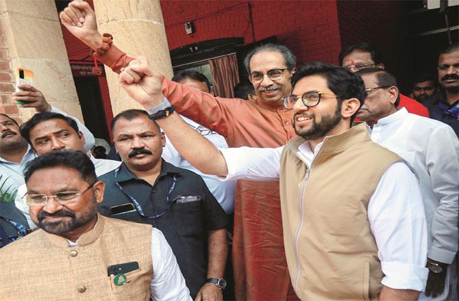 Uddhav Thackeray and Aaditya Thackeray outside Vidhan Bhawan in Nagpur. Photo: PTI