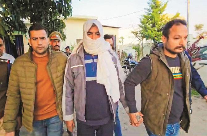 Uttarakhand police arrested Abdul Malik and took him away. (PTI)
