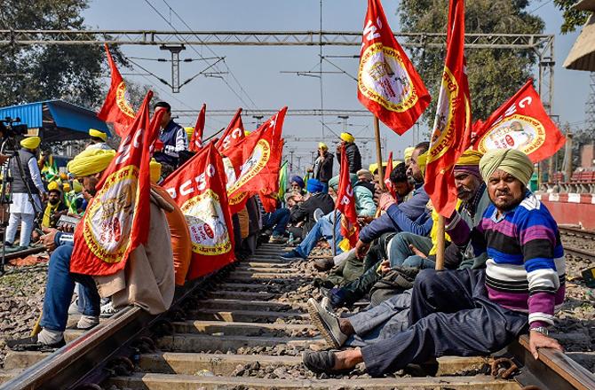 Farmers have thus blocked the railway track. Photo: PTI