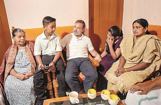 Rahul Gandhi during meeting with the family of forest watchman Ajesh. Photo: PTI
