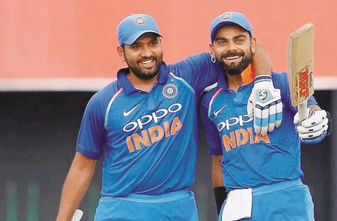 Virat Kohli and Rohit Sharma in happy mood. Photo: INN