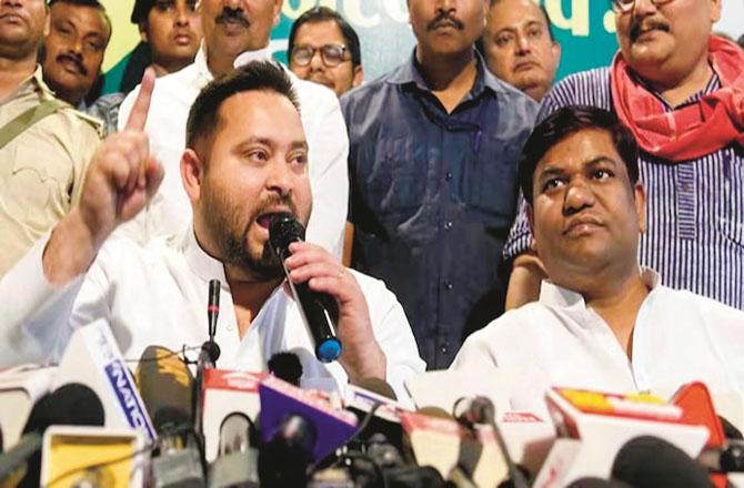 File photo of Vikas Shell Insan Party chief Mukesh Sahni and RJD leader Tejashwi Yadav