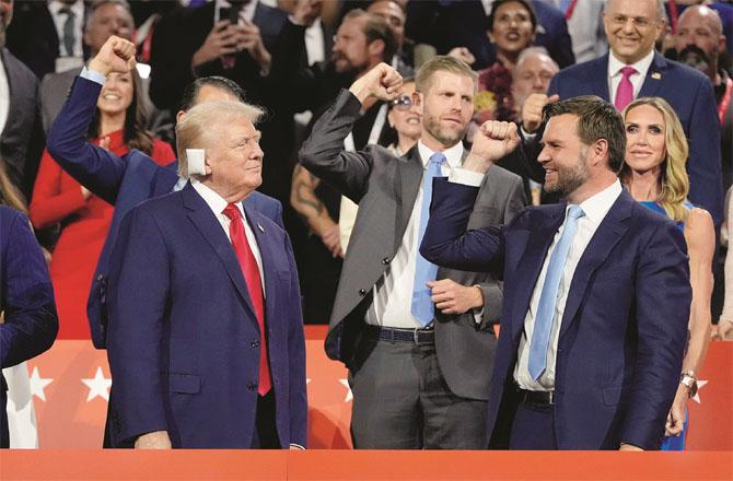 Donald Trump with vice presidential nominee JD Vance (right).