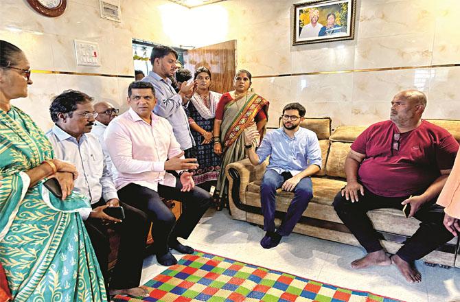 Members of Assembly Aslam Shaikh and Aditya Thackeray meeting the Naqua family.