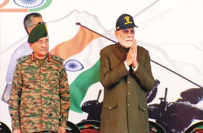 Prime Minister Modi on the occasion of Vijay Doss in Kargil. CDS General Anil Chauhan can also be seen with him. Photo: PTI