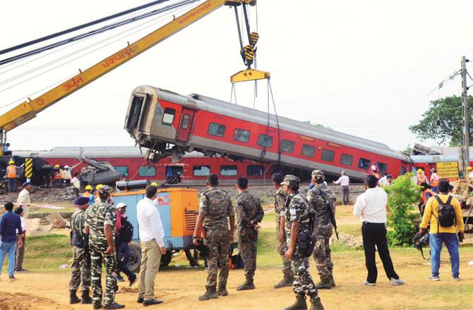 Efforts are being made to remove the coaches of the train from the track after the accident so that the movement of other trains can be restored. Photo: PTI