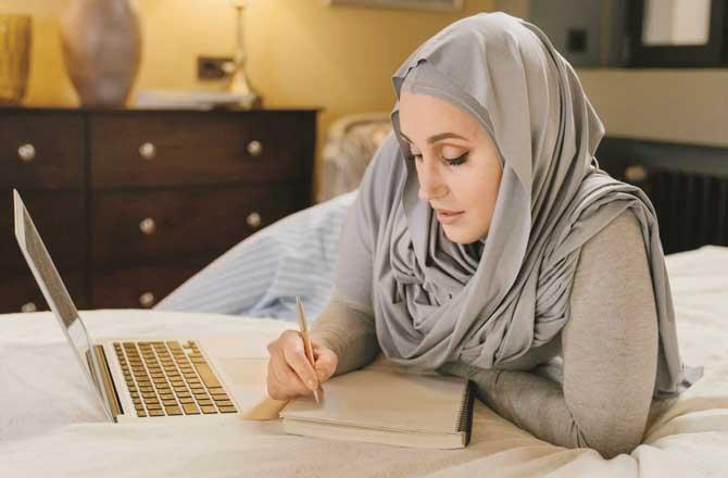 A Woman Writing a diary. Photo: INN