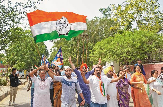 Congress workers celebrate victory in Chandigarh. Photo: PTI