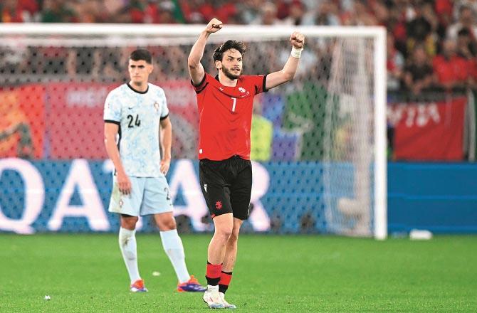 Georgia`s Khavicha Kvartsakhelia celebrates after scoring a goal against Portugal. Photo: INN
