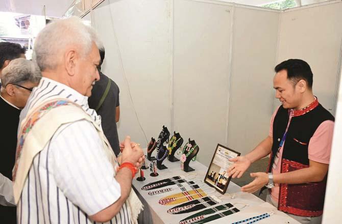 Lt. Governor getting product information at a stall. Photo: INN