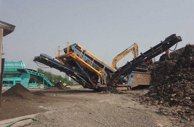 Garbage is being removed from Adharwadi dumping ground. Photo: INN