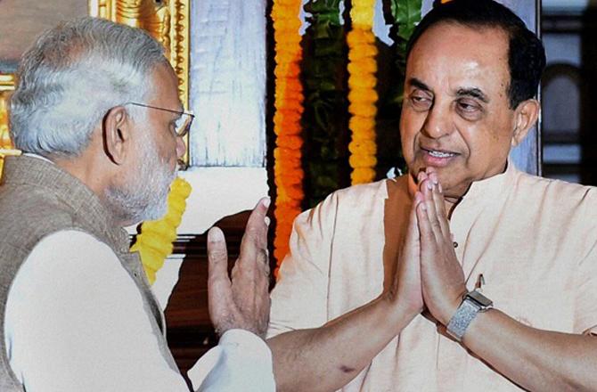 Swamy and Modi. Photo: INN